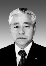写真：小倉　冨治