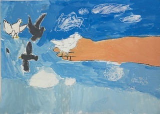 「私の手に集まるハトたち」の画像